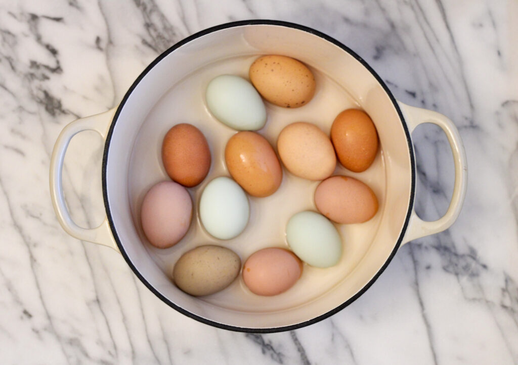 Dutch oven with water and eggs.