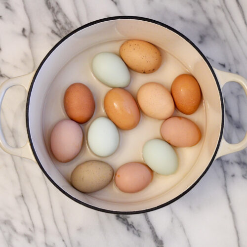 Dutch oven with water and eggs.