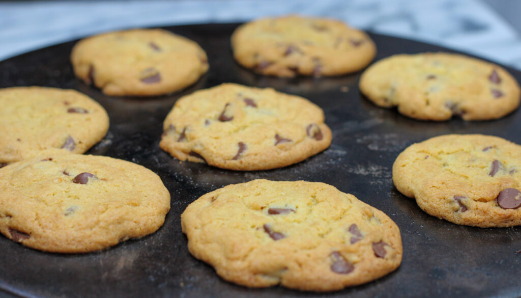 Sourdough chocolate chip cookies on baking stone