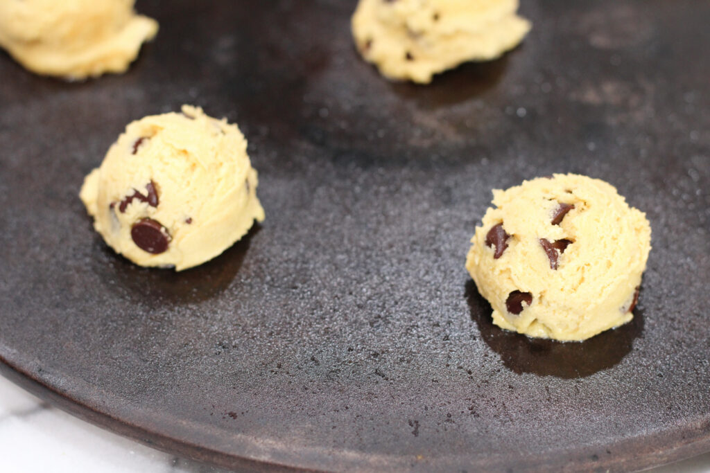 Sourdough chocolate chip cookie dough on baking stone