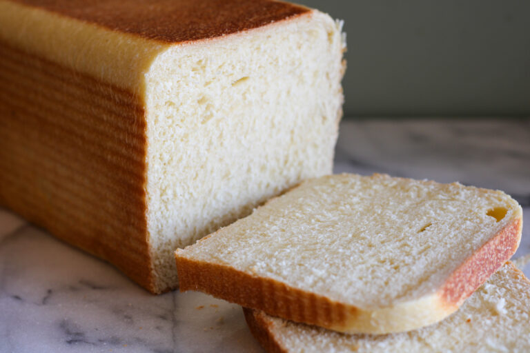 Sliced sourdough sandwich bread.