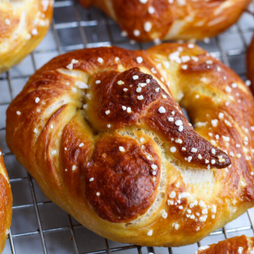 Sourdough soft pretzels on cooling rack.