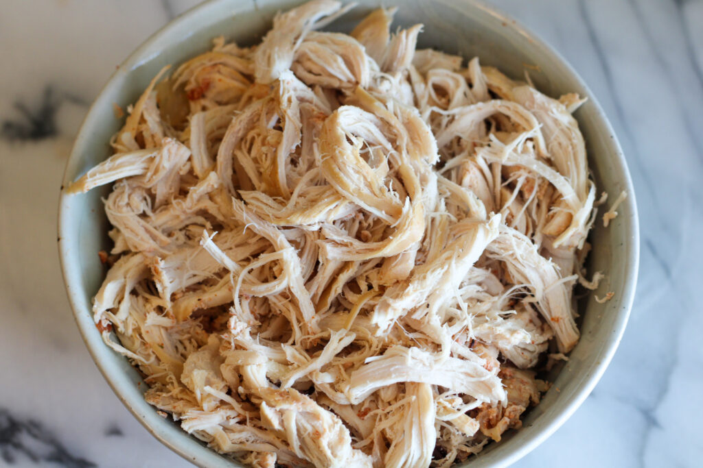 Bowl of shredded chicken breast
