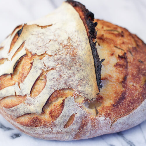 Loaf of sourdough herb bread.