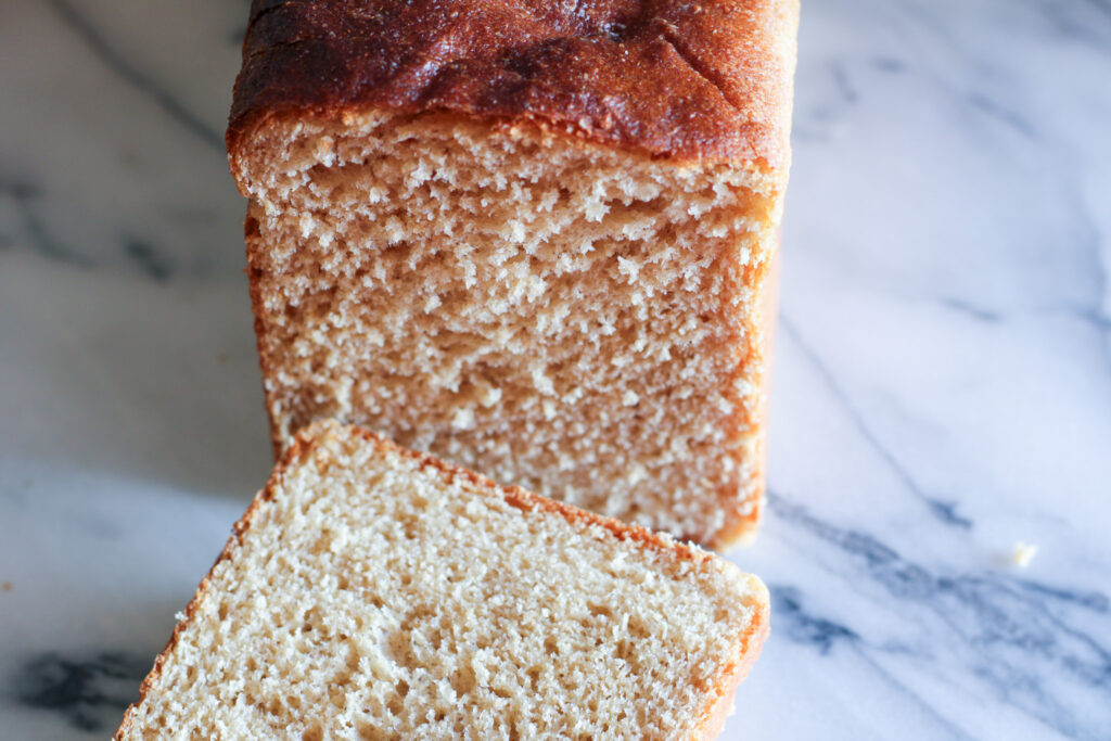 Sandwich bread with slice removed. 